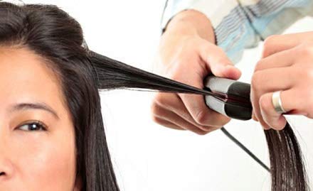 Front view of the ceramic mini hair styler, illustrating its dual styling capabilities.