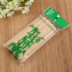 Natural bamboo skewers in clear packaging, ready for retail.