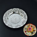 Silver color plastic Pooja Thali set with kumkum holders for rituals.