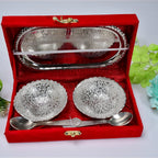 The two silver plated bowls and spoons neatly placed inside the rich red velvet gift box, ready for gifting.