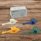 Four charming bird-shaped adhesive hooks neatly arranged, ready for use.