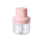 The sleek and compact design of the 250ml Electric Mini Garlic Chopper on a kitchen counter.