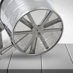 Multipurpose stainless steel flour sifter, an essential kitchen tool for baking.