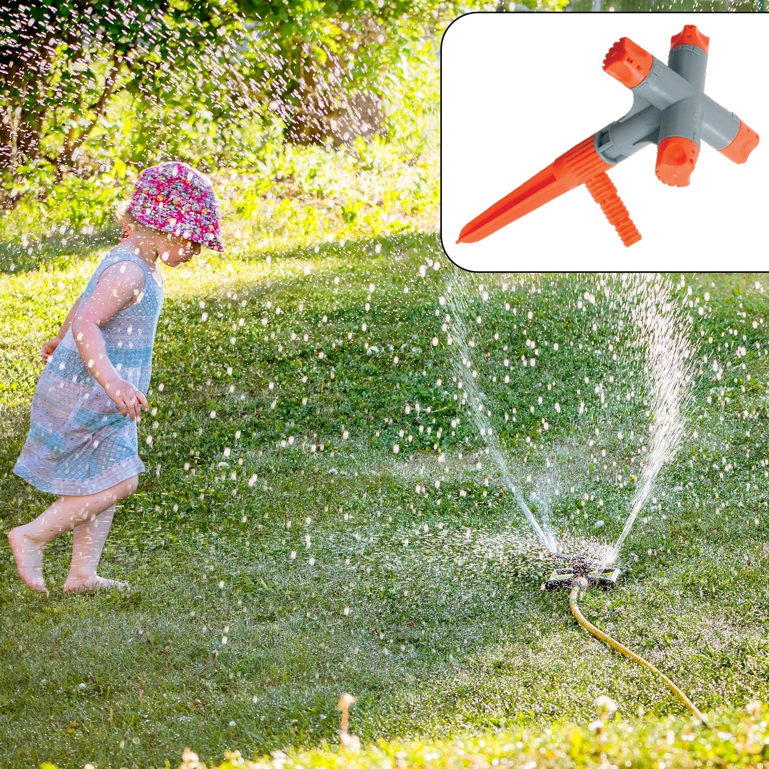 A 360° rotating garden sprinkler with four adjustable arms, watering a lush green lawn.