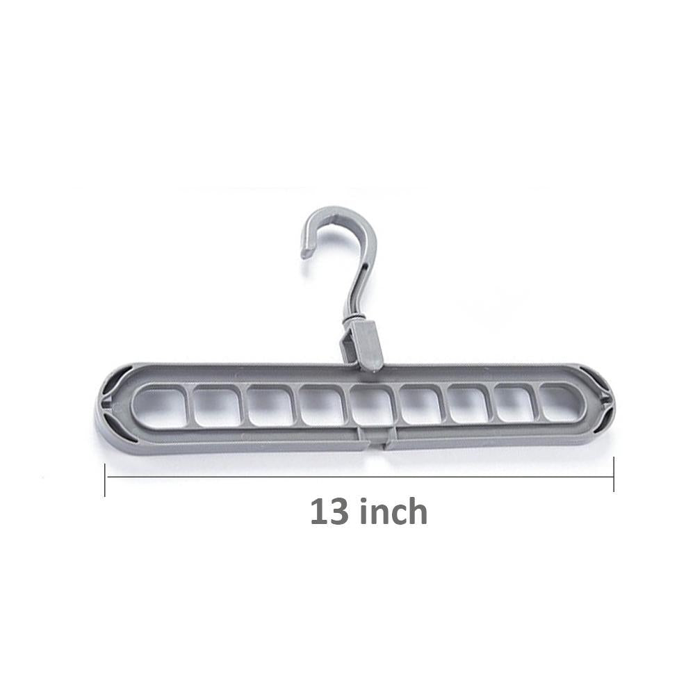 Close-up view of the nine precisely designed holes on the plastic hanger for secure garment storage.