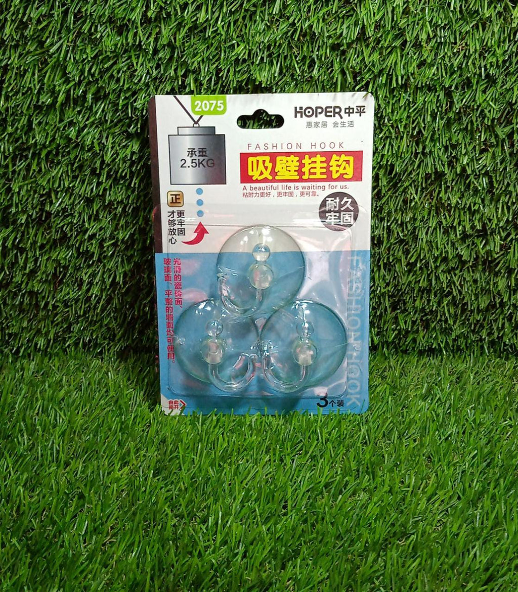 GlimmerHome transparent vacuum suction hooks in a modern kitchen setting.