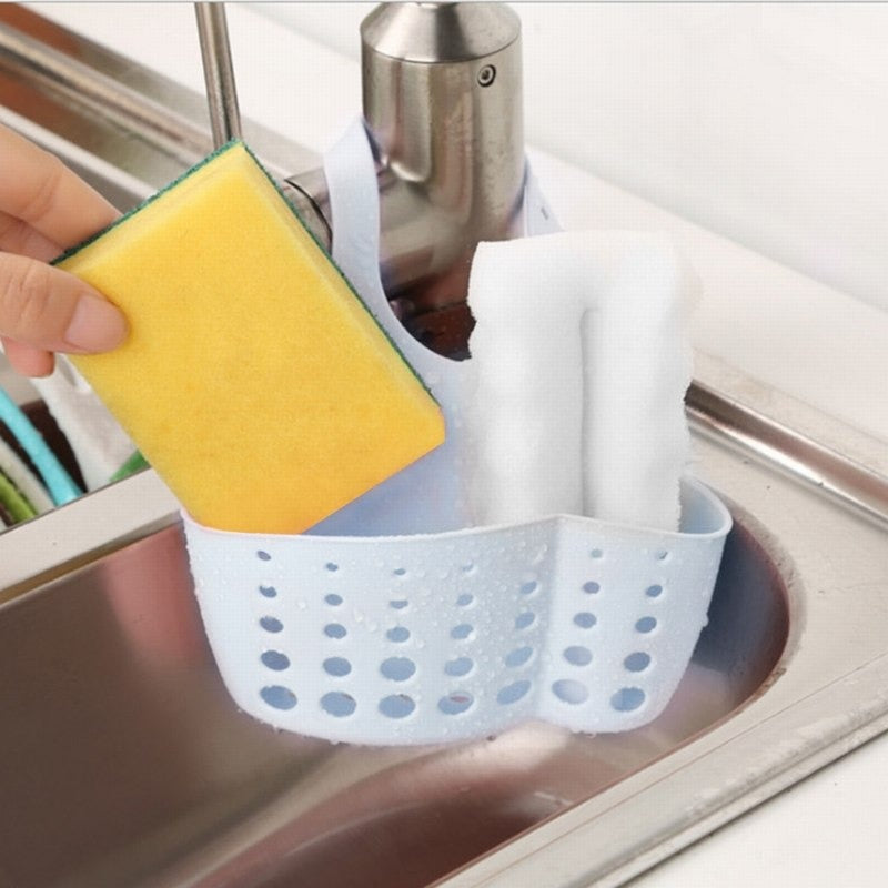 Compact kitchen sink organizer in a clean white finish.