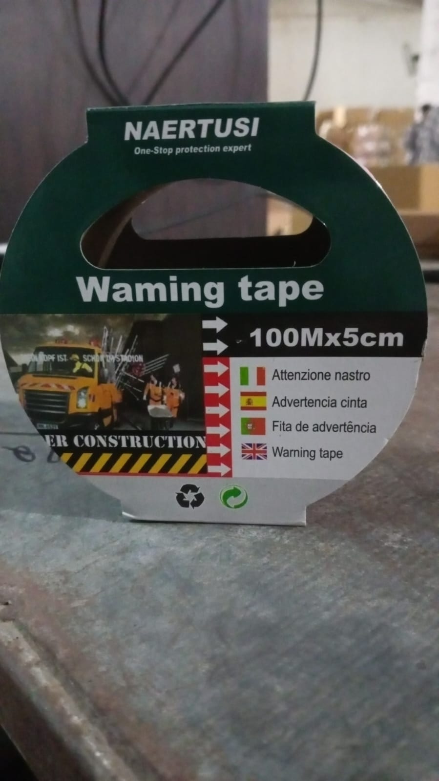 Detailed view of the red and white safety marking tape.