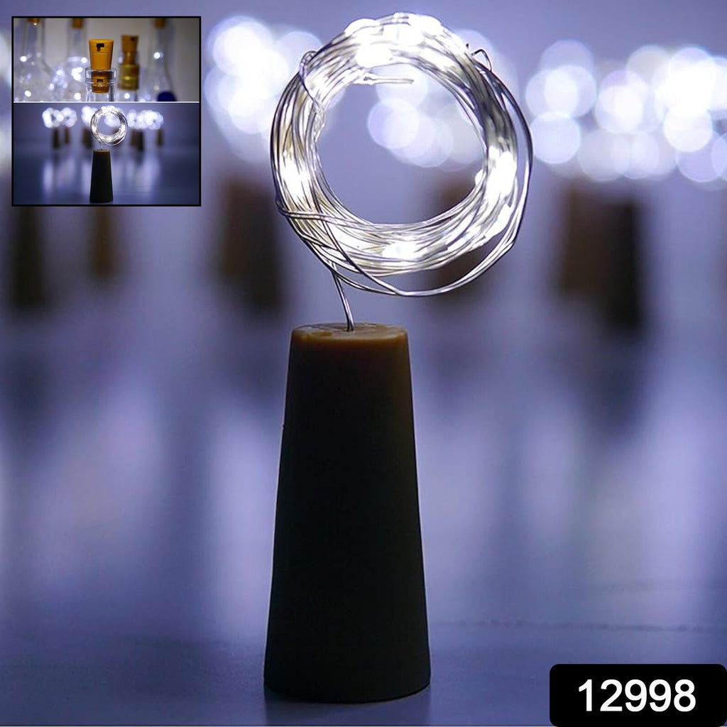 A close-up of the cork base with integrated LED string lights for bottle decoration.