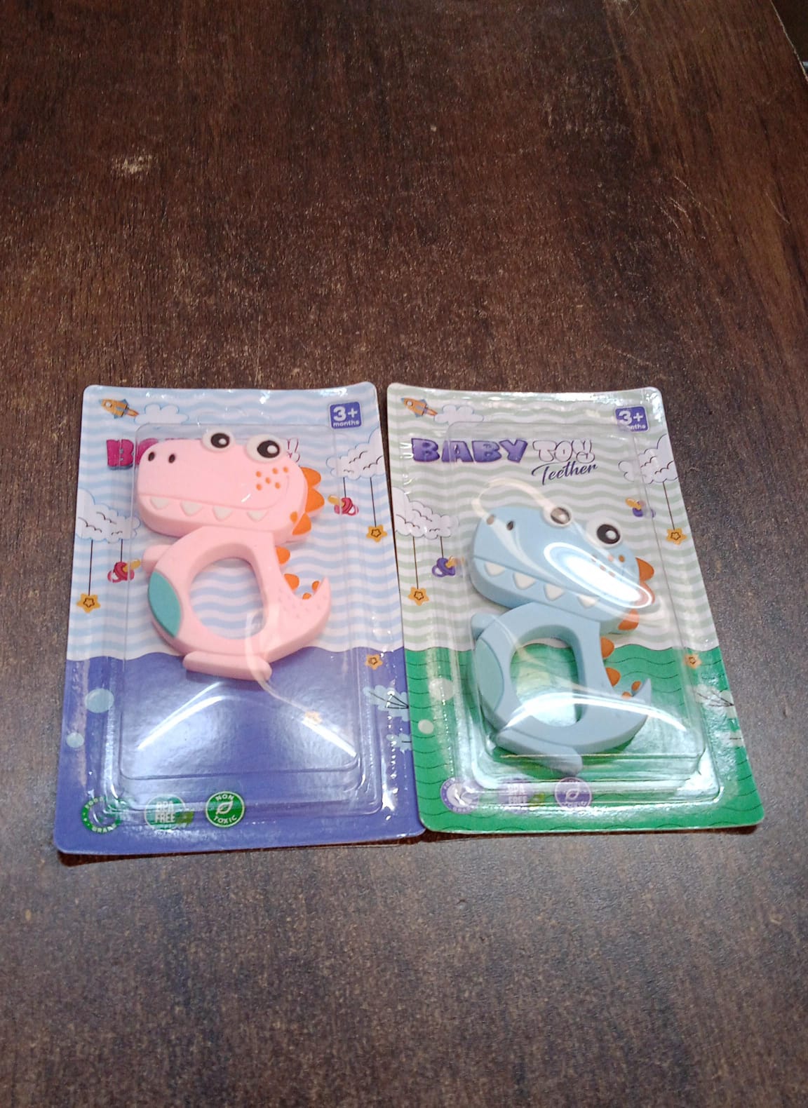 Collection of safe silicone dinosaur teething toys for babies