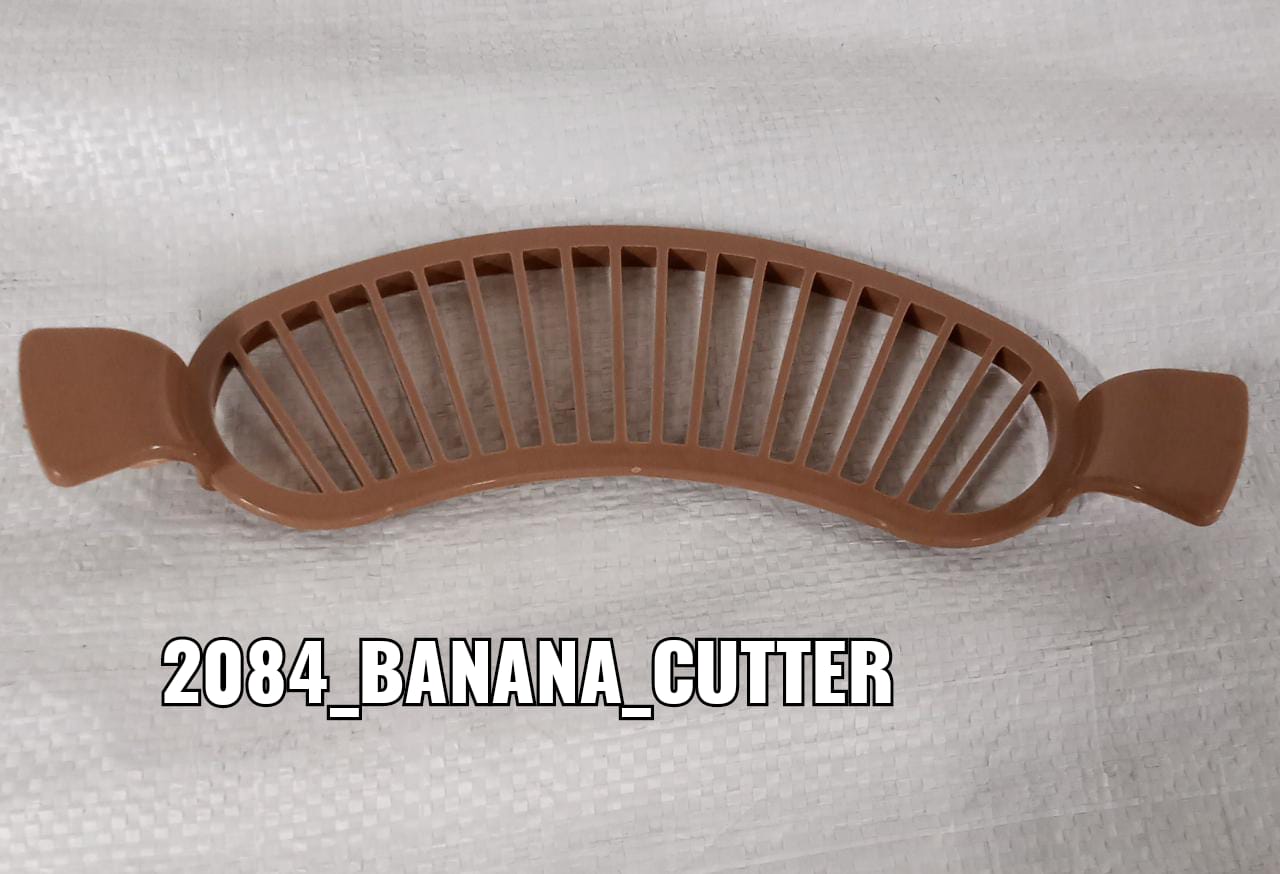 Compact plastic banana cutter with comfortable grip for daily use.
