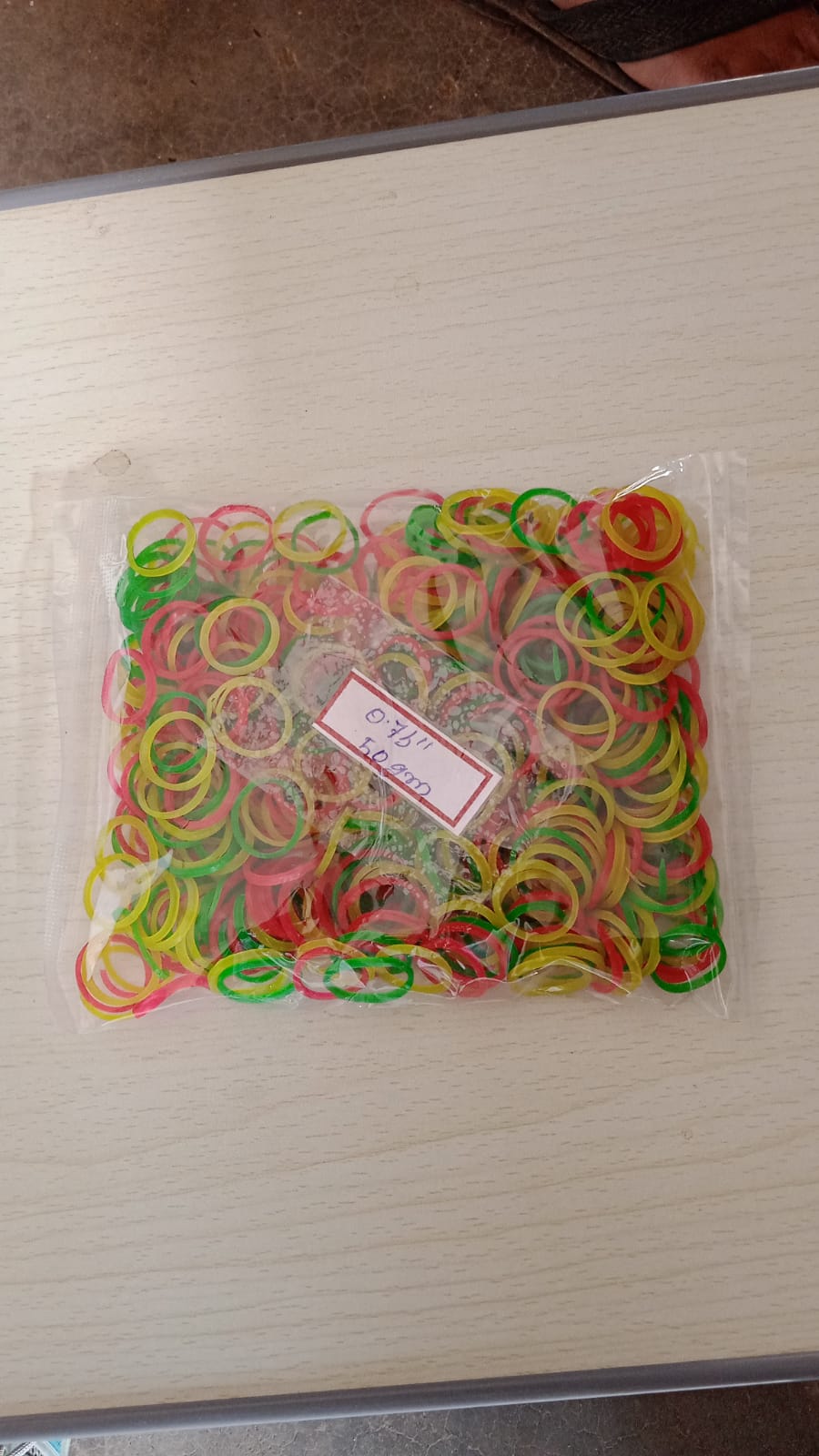 Pile of flexible nylon rubber bands, suitable for a wide range of organizing tasks.
