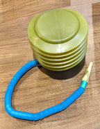 Lifestyle shot of the foot air pump used for a yoga ball.
