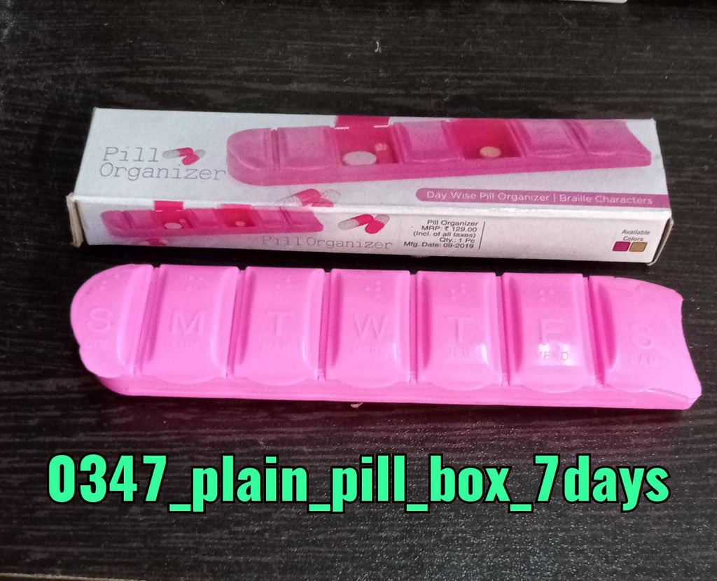 Top view of the heptagon-shaped 7-day medicine organiser, ready for use.