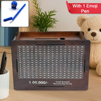 Wooden piggy bank with savings goal of 1,00,000 Rupees and included Emoji Pan