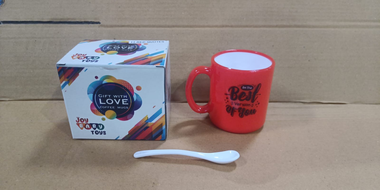 Coffee mug with unique design, includes spoon and elegant gift box.