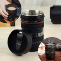 Realistic camera lens coffee mug with a black plastic exterior and silver accents.