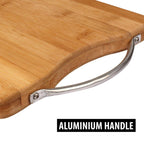 Underside view of the wooden chopping board, clearly showing the non-slip mat.
