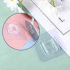 Lifestyle image of a waterproof self adhesive wall hook organizing items in a bathroom.