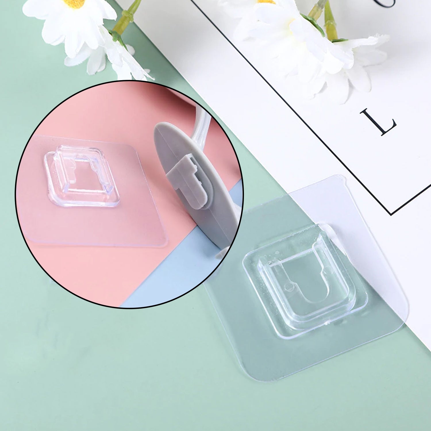 Lifestyle image of a waterproof self adhesive wall hook organizing items in a bathroom.