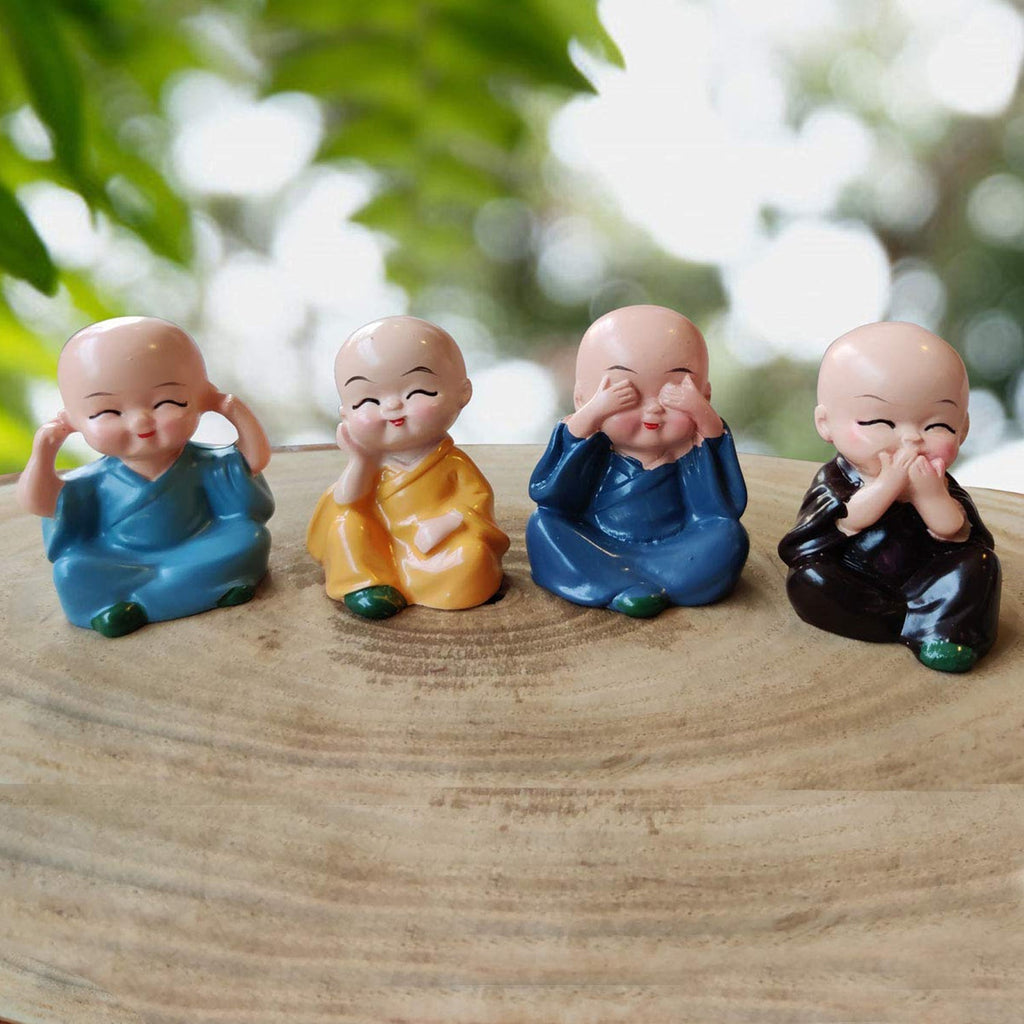 4-piece baby Buddha statues set showcasing serene expressions
