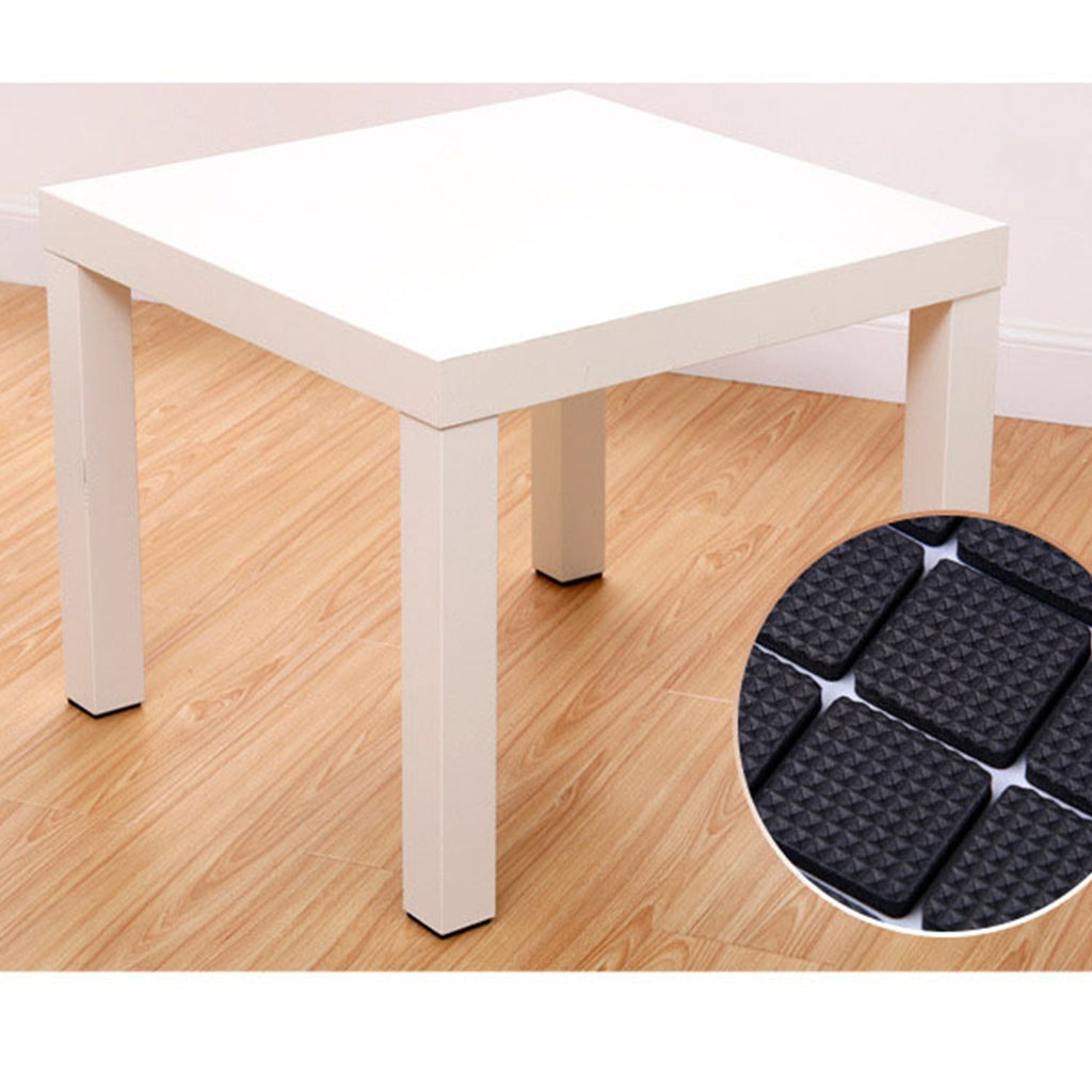 A 28-piece set of self-adhesive rubber furniture pads for floor protection.