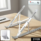 Aluminium adjustable laptop stand supporting laptop on table