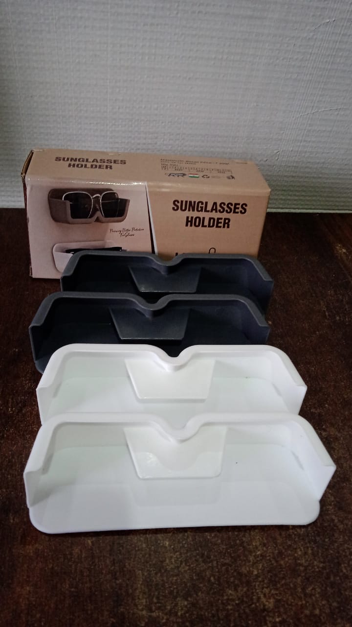 Vertical display of wall mounted sunglasses holders, ideal for maximising space and keeping eyewear tidy.