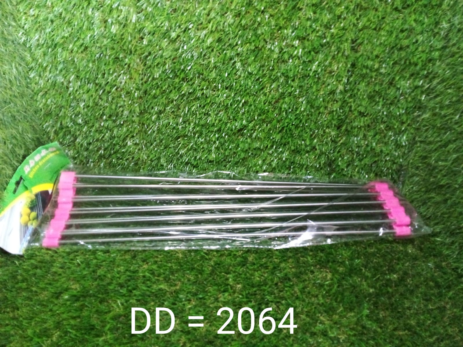 Foldable kitchen sink rack made of silicone-coated stainless steel, enhancing kitchen efficiency.