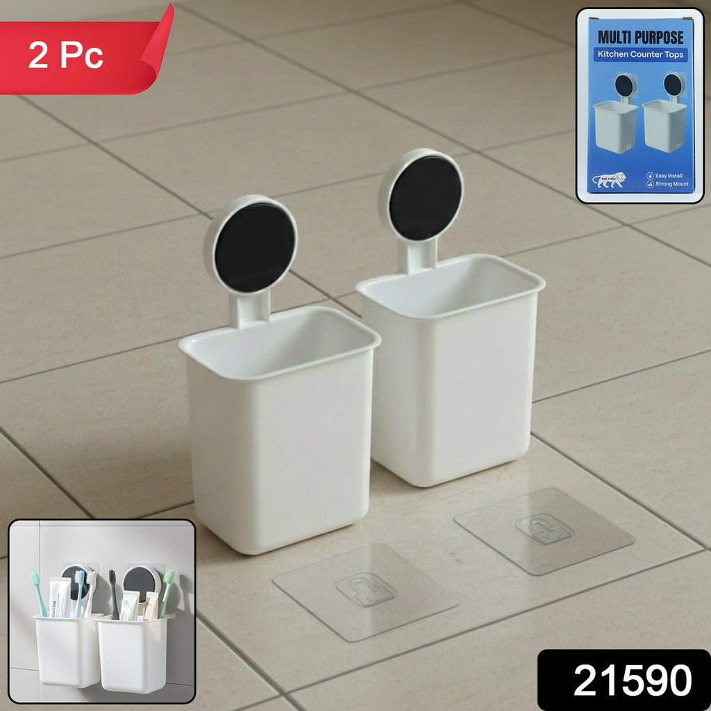 White wall mounted toothbrush holder with adhesive backing on tiled bathroom wall