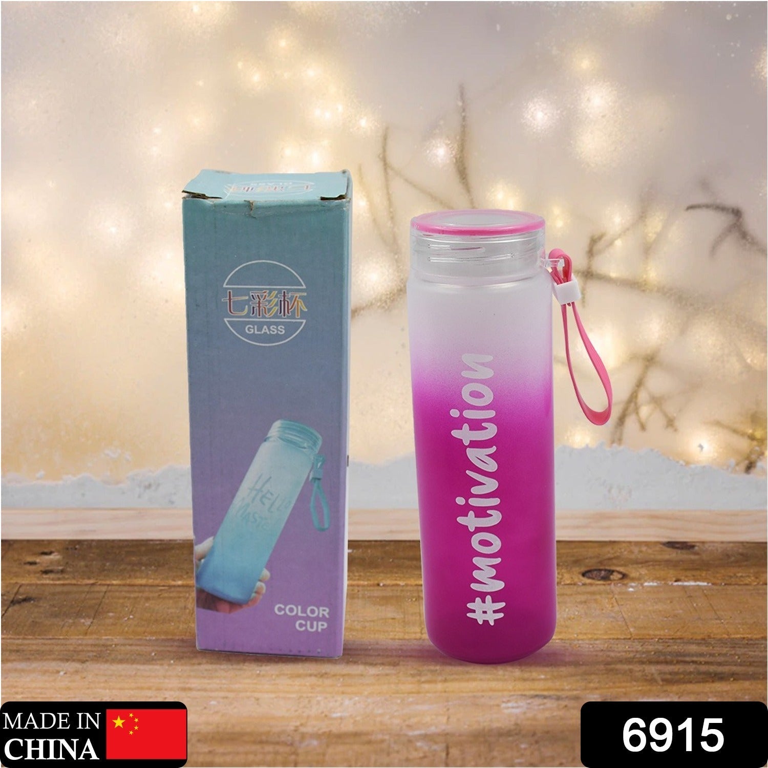 Ergonomic glass water bottle featuring a protective rubber grip band for secure handling.