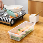A 1500ml food storage box with its lid ajar, showcasing its interior.