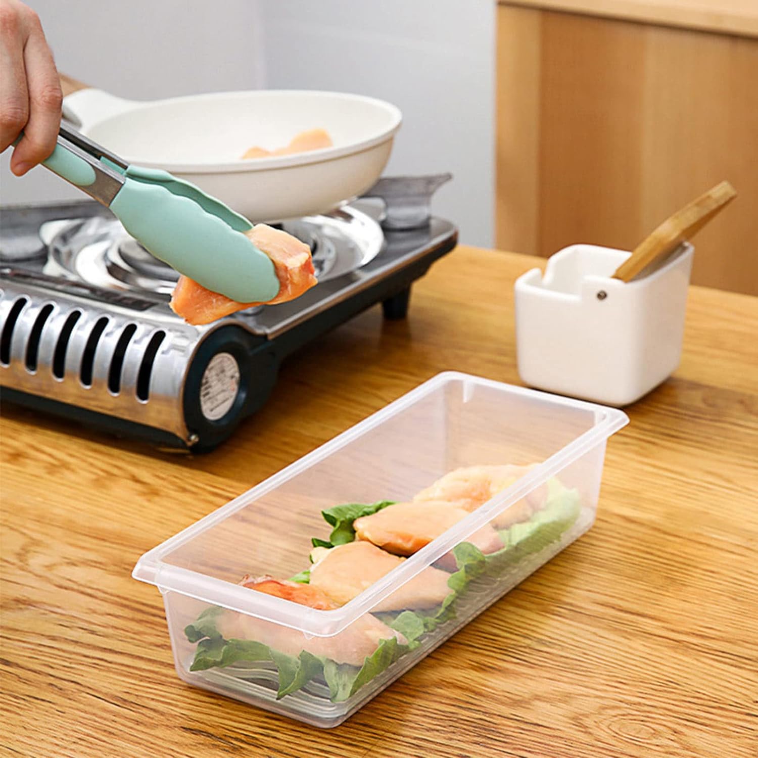 A 1500ml food storage box with its lid ajar, showcasing its interior.
