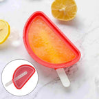 Close-up of the flexible watermelon ice mould with a lid.