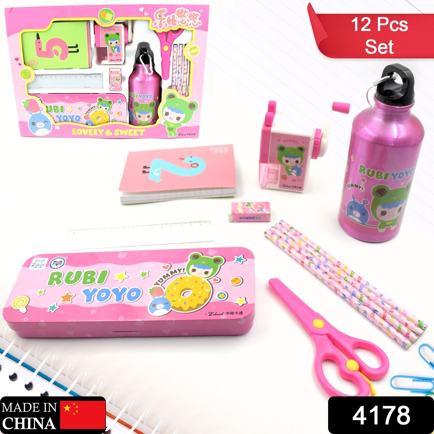 Overhead view of the 12-piece kids stationery set with pencils, ruler, eraser, and bottle.