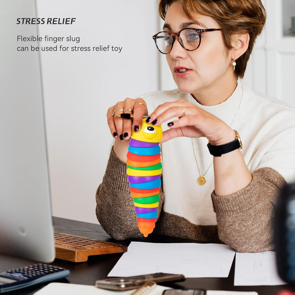 Stress-relieving rainbow plastic slug fidget toy curled into a compact, engaging shape.