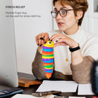 Stress-relieving rainbow plastic slug fidget toy curled into a compact, engaging shape.