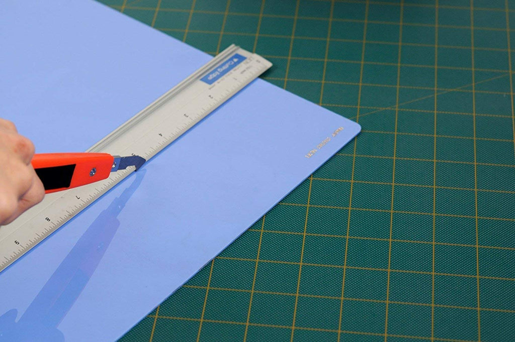 Ergonomic handle of the heavy-duty acrylic sheet cutter, showing its comfortable grip.