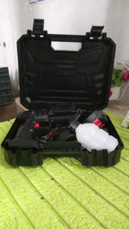 Lifestyle shot of the portable car washer gun being used for outdoor cleaning.