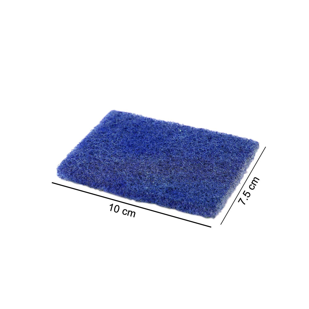 Close-up view of a Quickslice green scrubber pad, highlighting its texture.