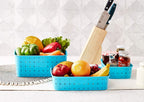 Set of three sky blue storage baskets, perfect for kitchen organization.