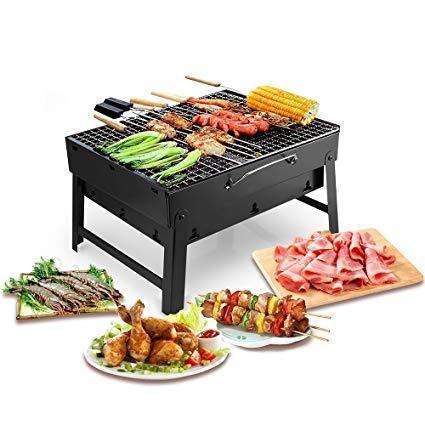 Close-up of the Siplix carbon steel charcoal grill with cooking grate.