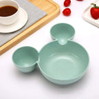 Mickey-shaped kids snack serving plate showcasing its vibrant color.
