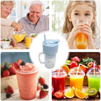 Fresh smoothie in the portable juicer cup with a straw, placed on a table.