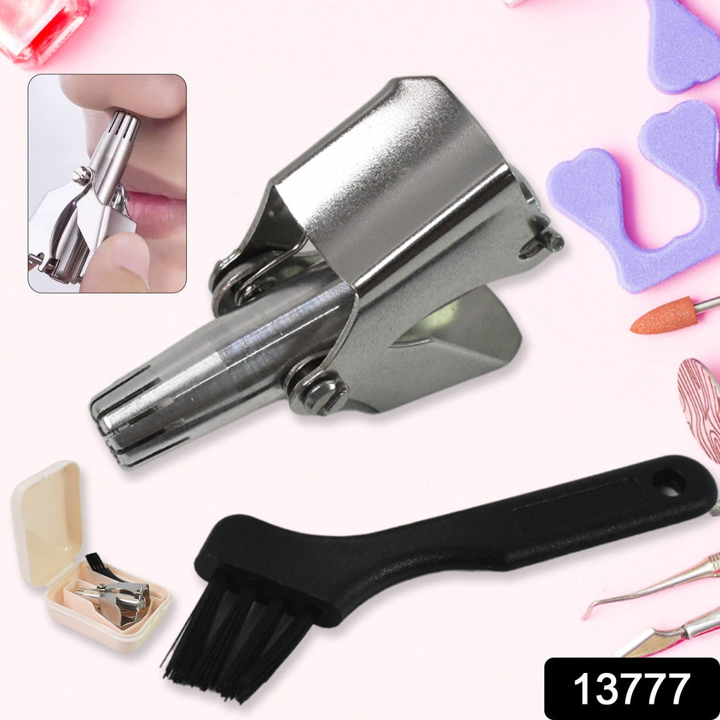 Close-up of the manual nose hair clipper, highlighting its precise cutting mechanism.