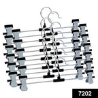 Stainless steel hangers with adjustable clips securely holding a pair of trousers.