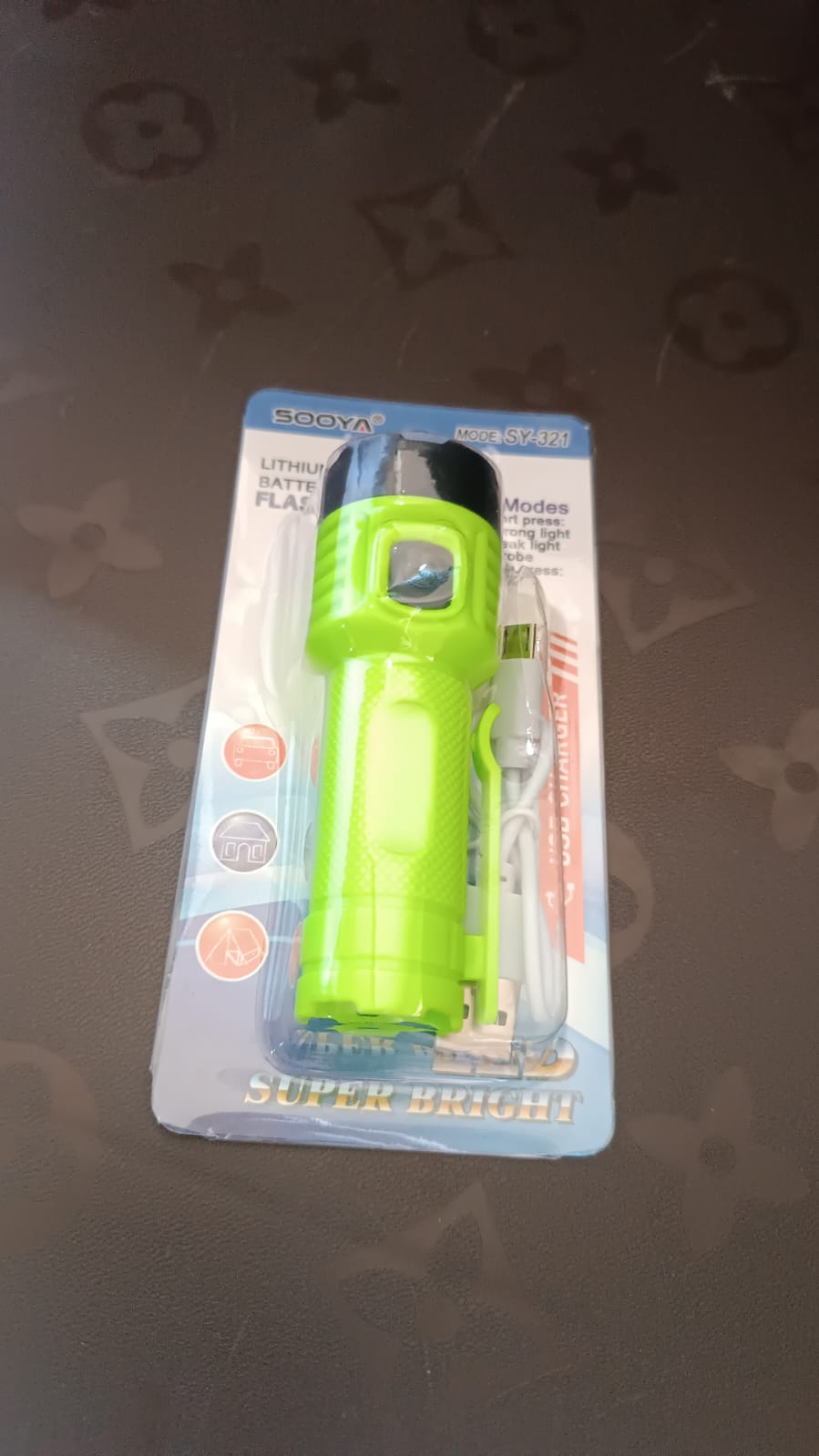 LED flashlight torch carried during outdoor activities like camping