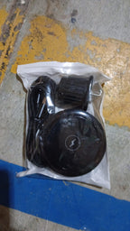User demonstrating the compact design of the magnetic wireless car charger.