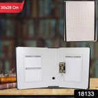 Close-up of the secure button clip closure on the box file.