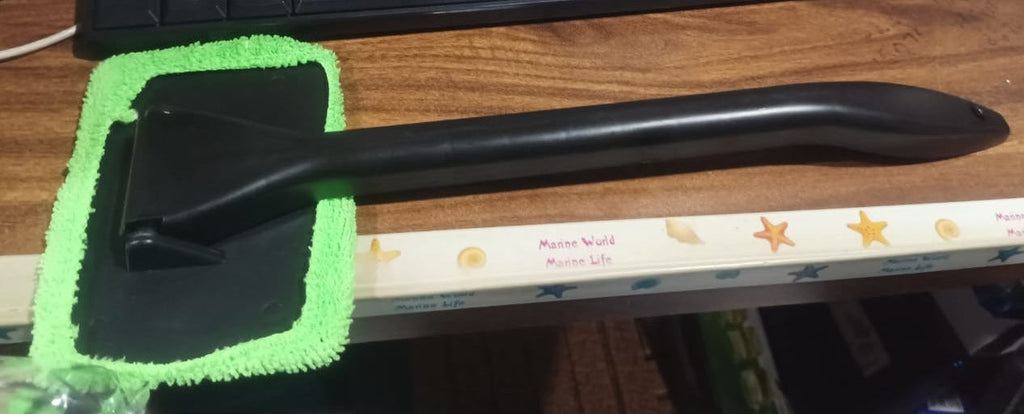 Close-up of the textured microfiber pad designed for streak-free cleaning.